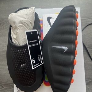 Nike Black and Orange Slip-On Sneakers